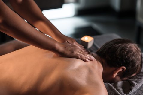 masseur-giving-man-neck-massage-in-spa-less-scaled.jpg