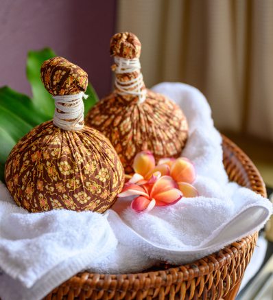 thai-massage-with-herbal-hot-compress-ball-loss-scaled.jpg